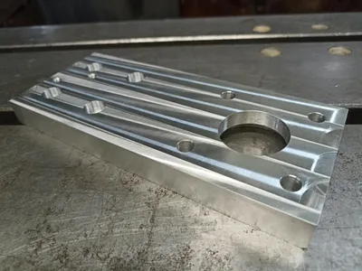 Milled plate with holes