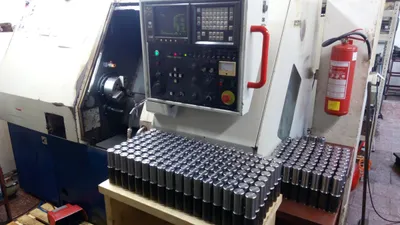 Turning centre with a batch of finished parts